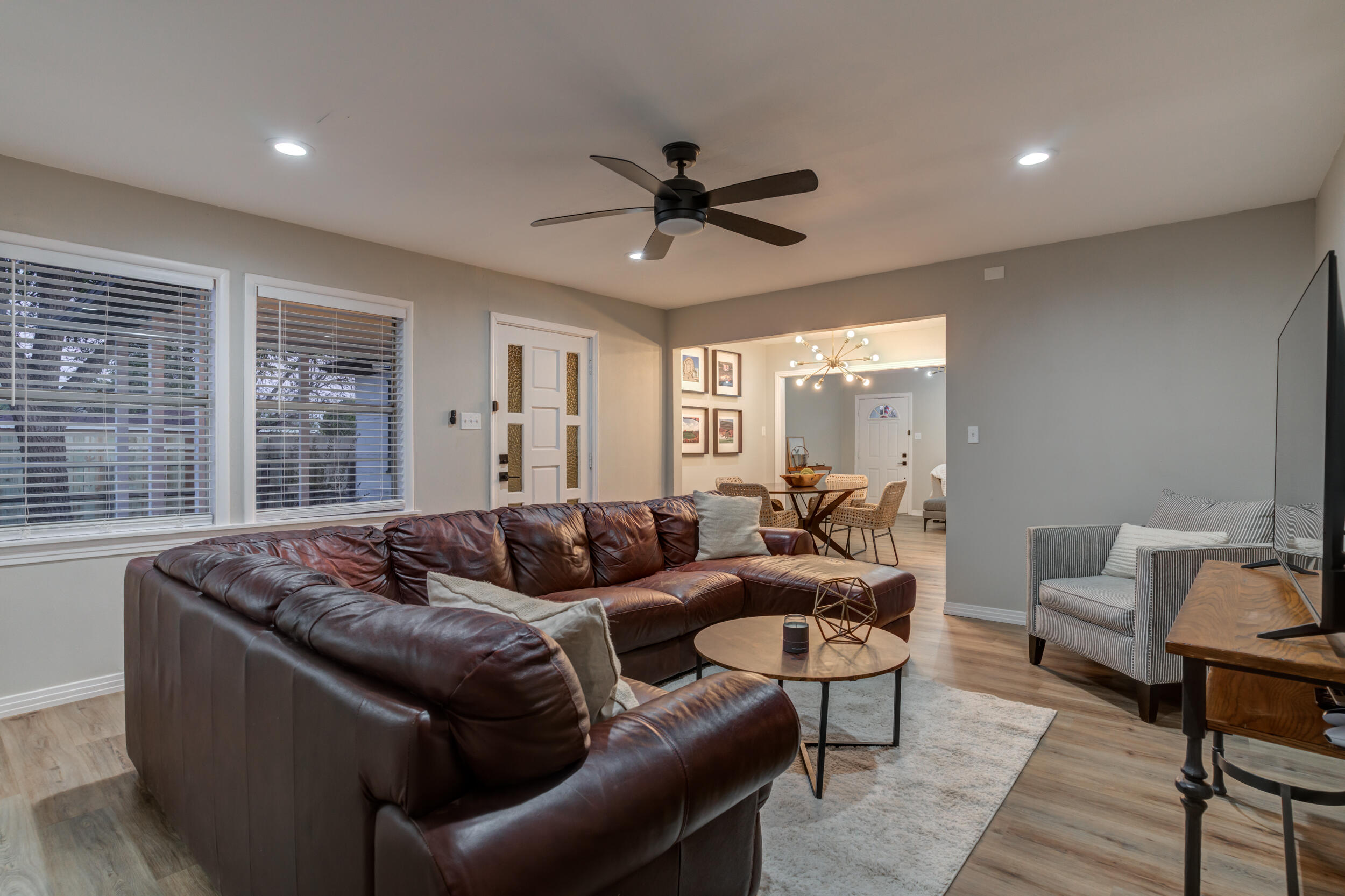 2802 39th Street Lubbock, TX 79413 - Photo 32 of 61 a living room with furniture and a large window