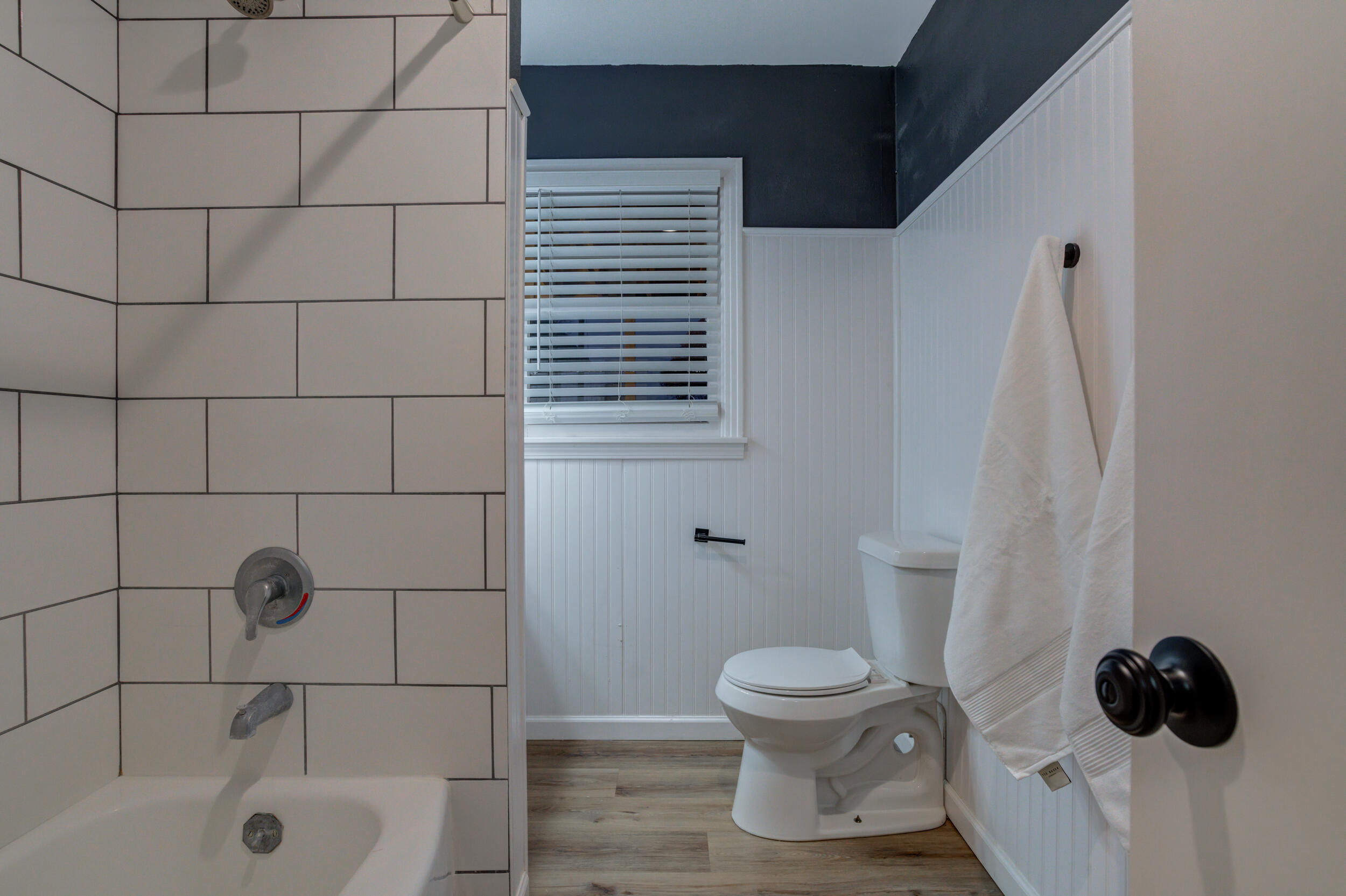 2802 39th Street Lubbock, TX 79413 - Photo 48 of 61 a bathroom with a toilet and a shower