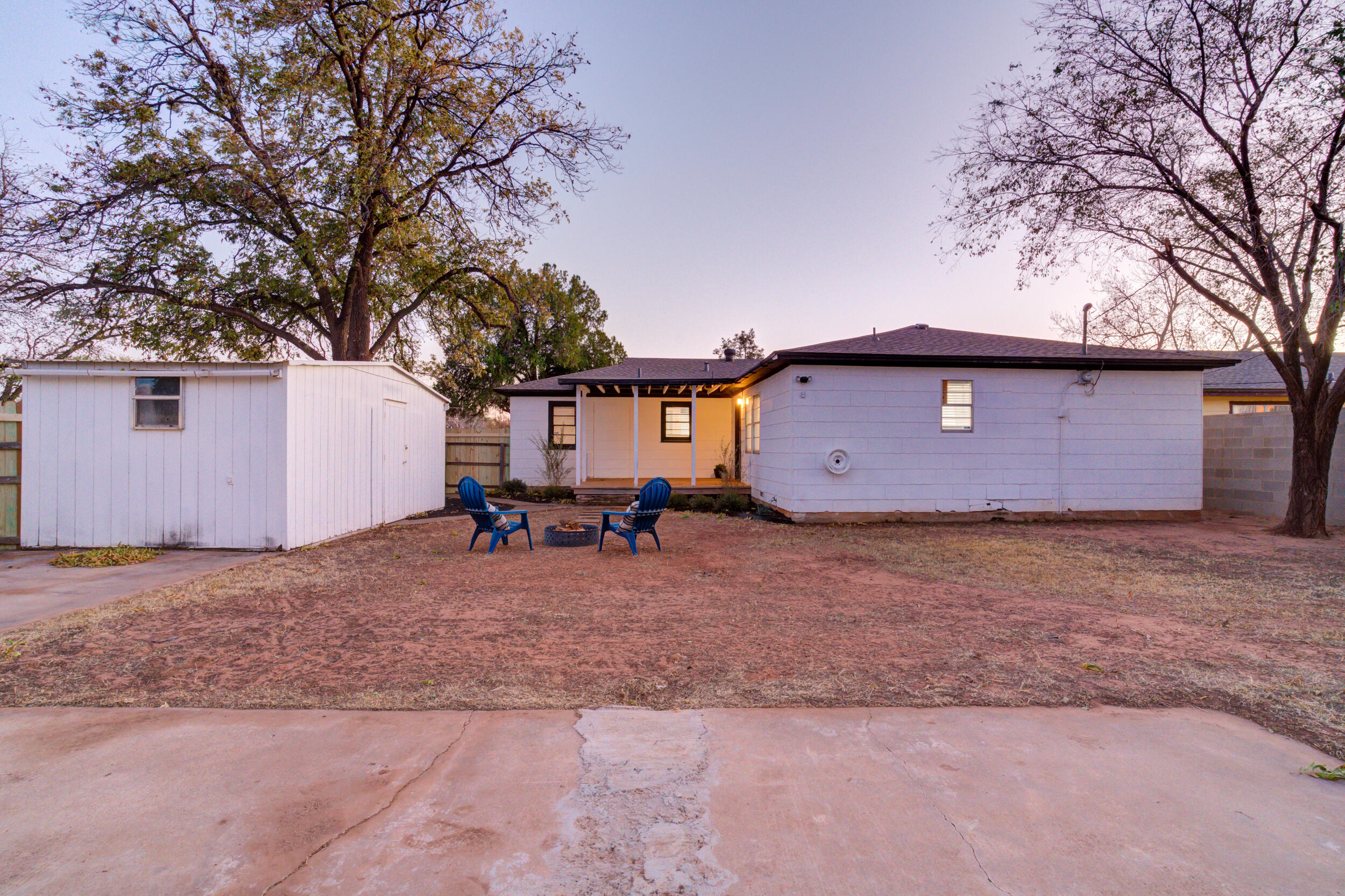 2802 39th Street Lubbock, TX 79413 - Photo 58 of 61 a view of a house with a yard and garage