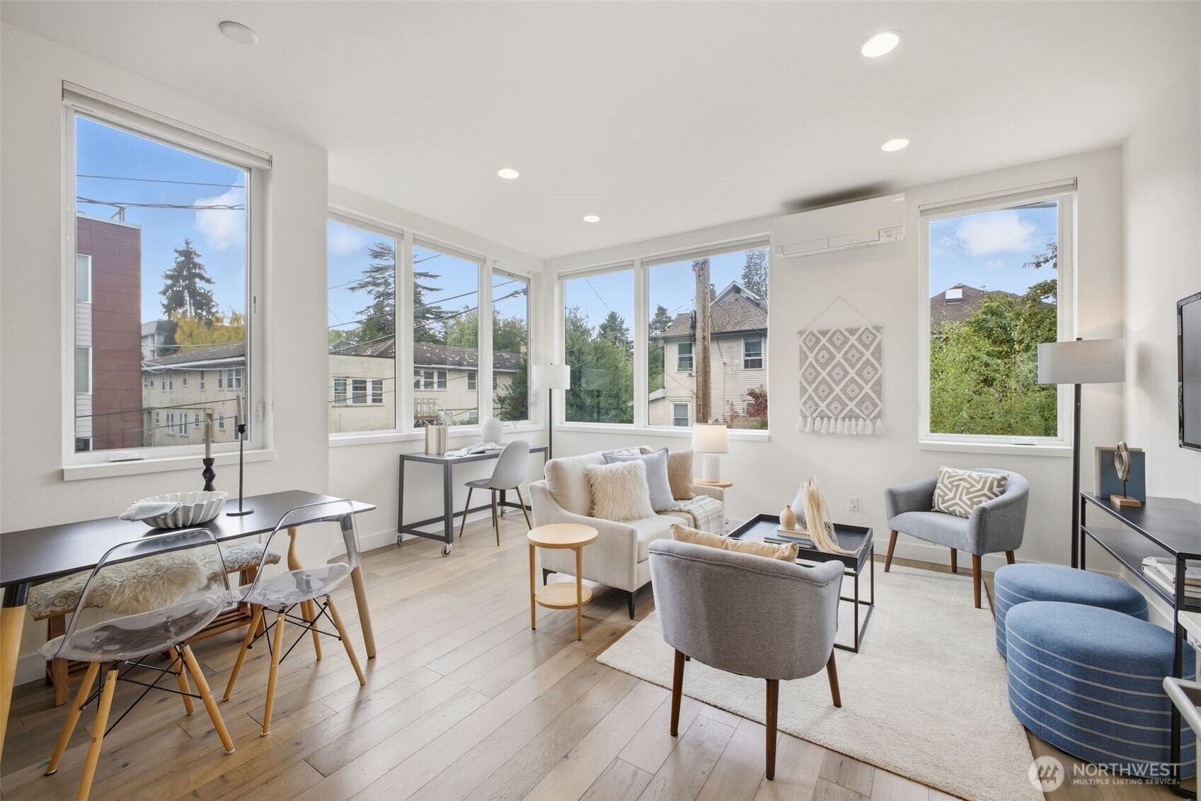 119 A 18th Avenue East Seattle, WA 98112 - Photo 2 of 24 a living room with furniture and a large window