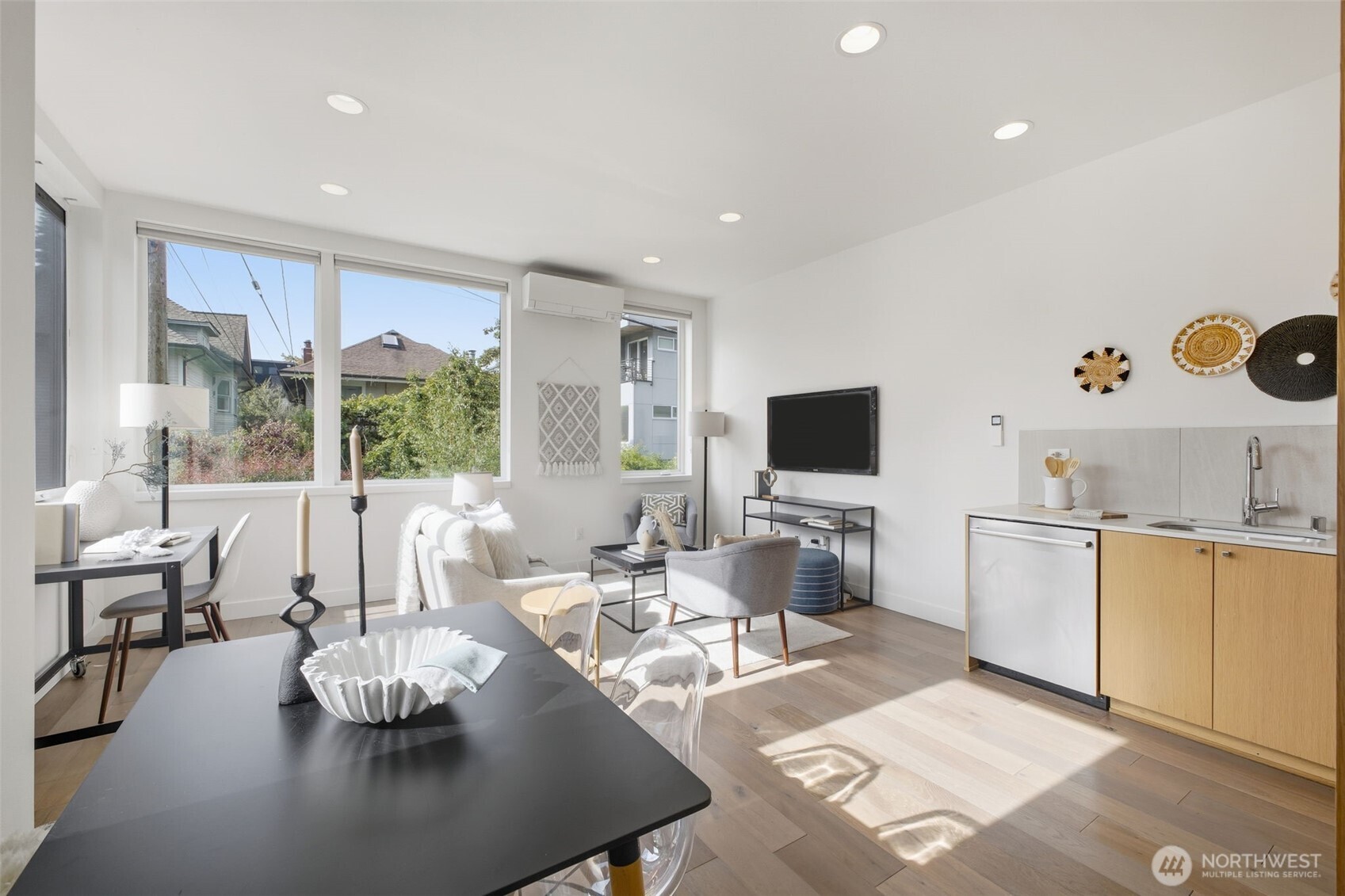 119 A 18th Avenue East Seattle, WA 98112 - Photo 6 of 24 a living room with furniture and a flat screen tv