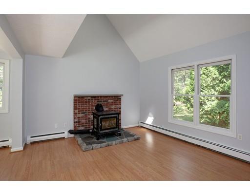 215 Simons Road Mashpee, MA 02649 - Photo 3 of 19 a living room with hard wood floors and a window