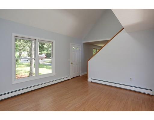 215 Simons Road Mashpee, MA 02649 - Photo 4 of 19 a view of an empty room with a window