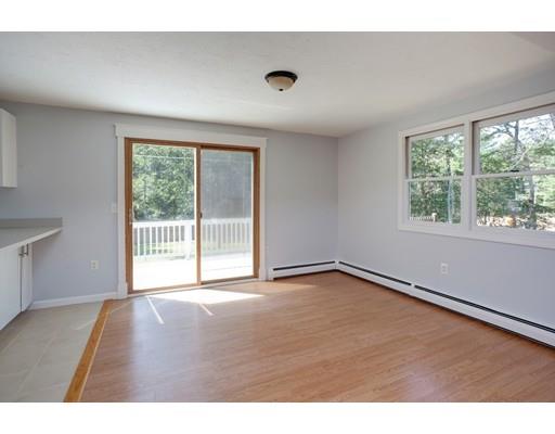 215 Simons Road Mashpee, MA 02649 - Photo 5 of 19 a view of an empty room with a window