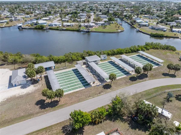 an aerial view of a house with outdoor space