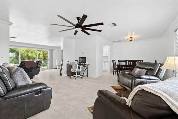 a living room with furniture and a window