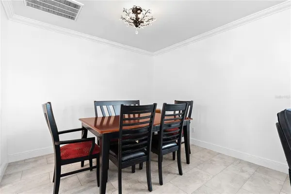 a view of a dining room with furniture