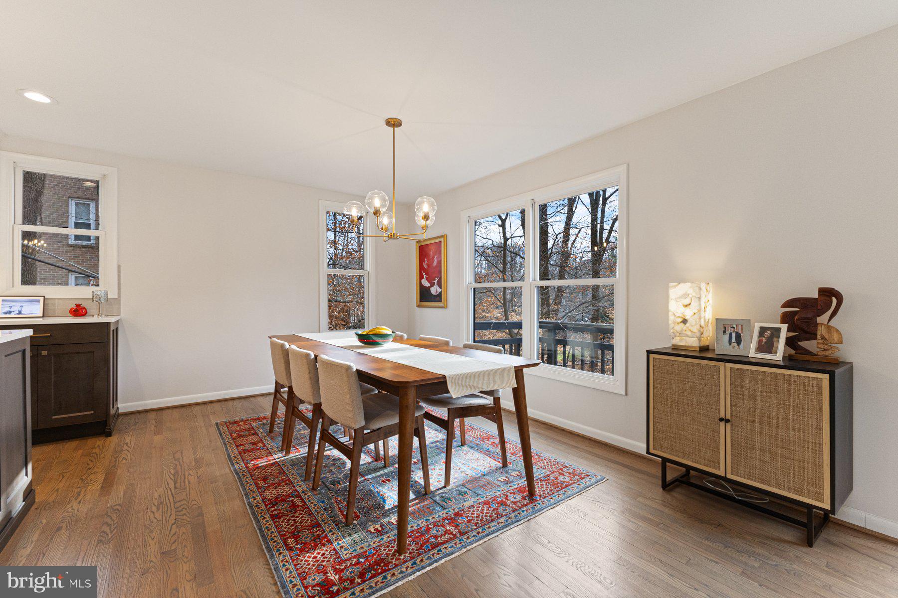 1875 Massachusetts Avenue McLean, VA 22101 - Photo 21 of 52 a view of a dining room with furniture window and wooden floor