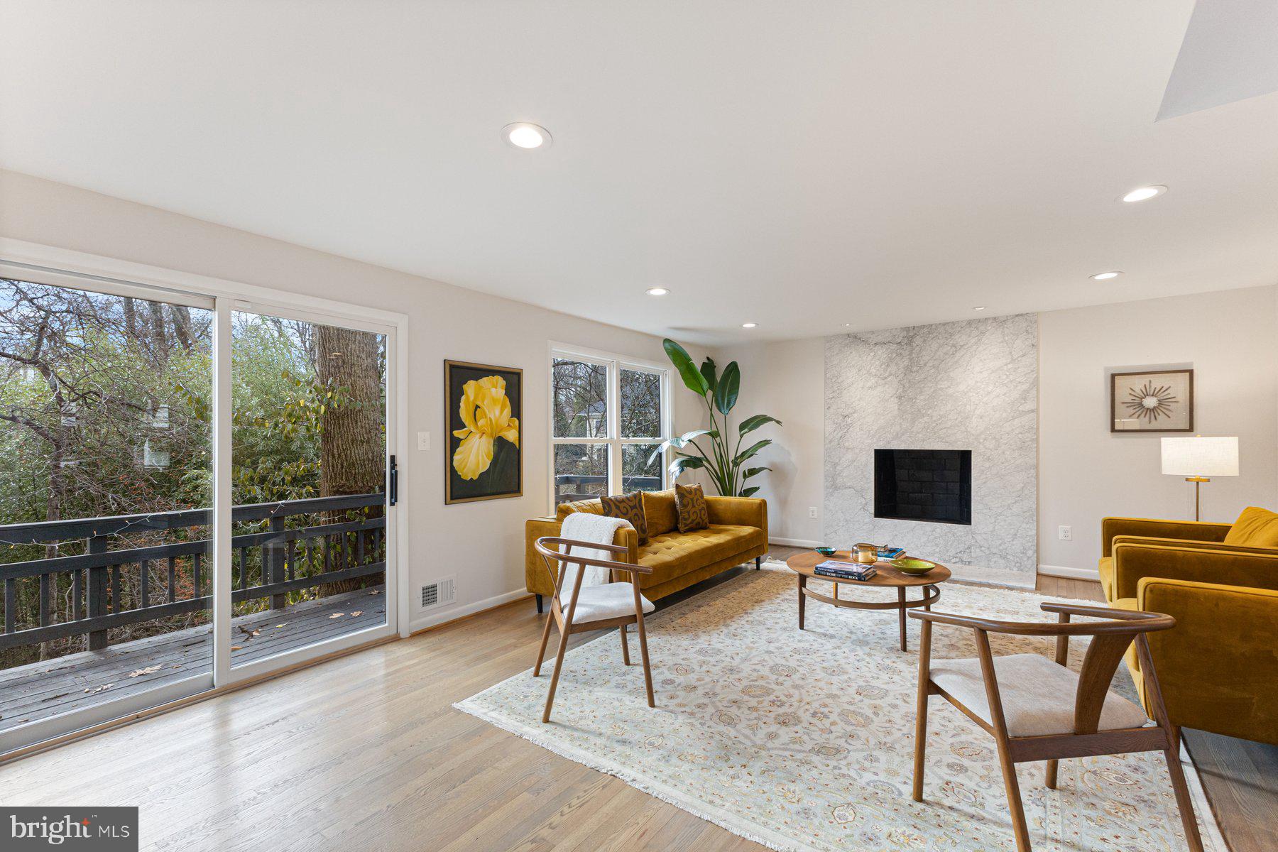 1875 Massachusetts Avenue McLean, VA 22101 - Photo 22 of 52 a living room with furniture and a flat screen tv