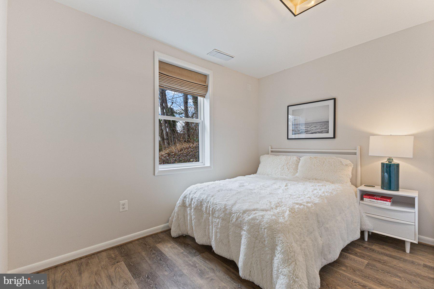 1875 Massachusetts Avenue McLean, VA 22101 - Photo 34 of 52 a bedroom with a bed and a window