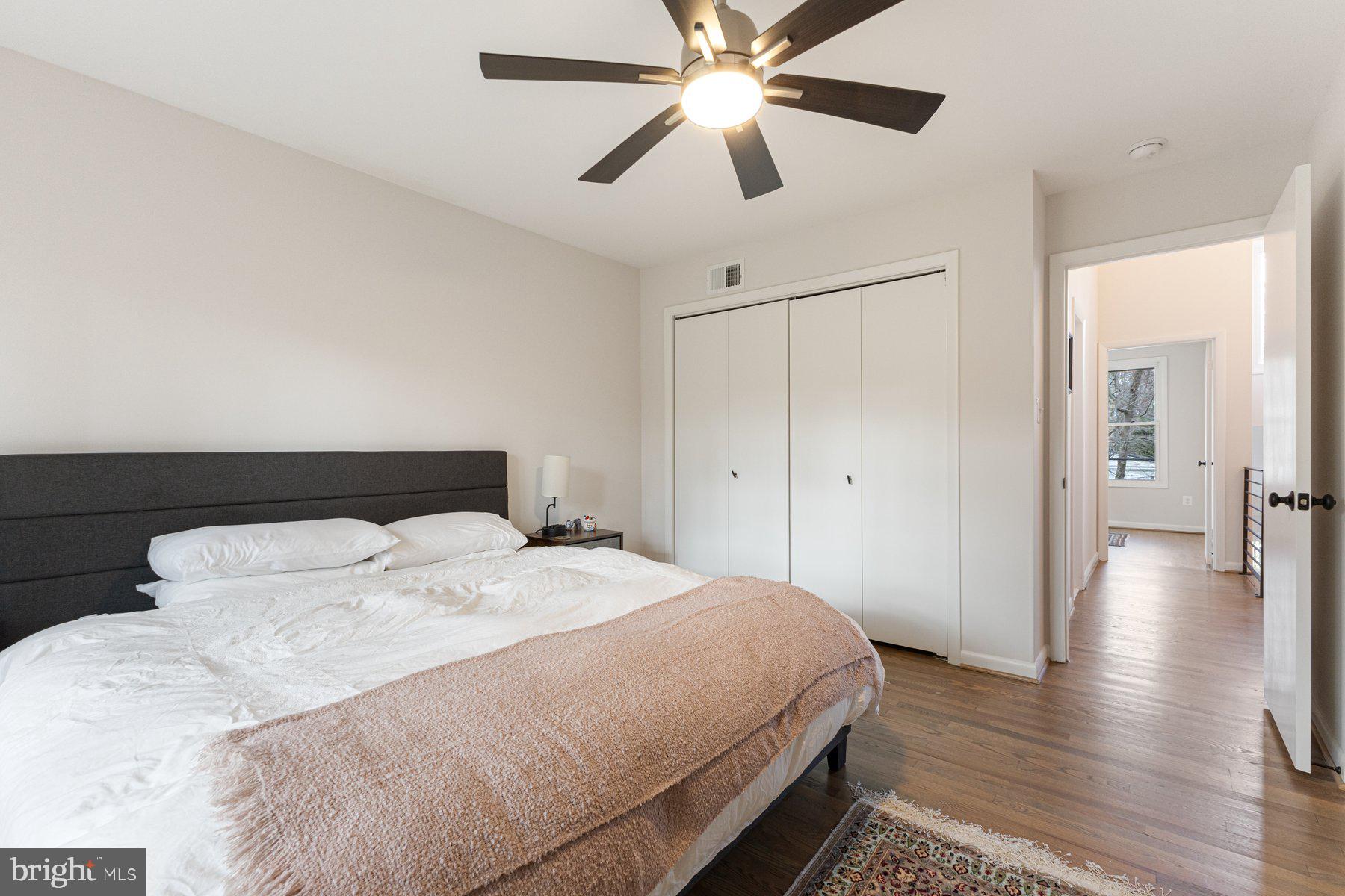 1875 Massachusetts Avenue McLean, VA 22101 - Photo 45 of 52 a bedroom with a bed and a chandelier