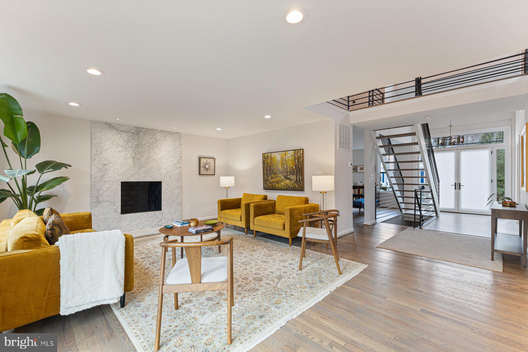 1875 Massachusetts Avenue McLean, VA 22101 - Photo 8 of 52 a living room with furniture and a flat screen tv