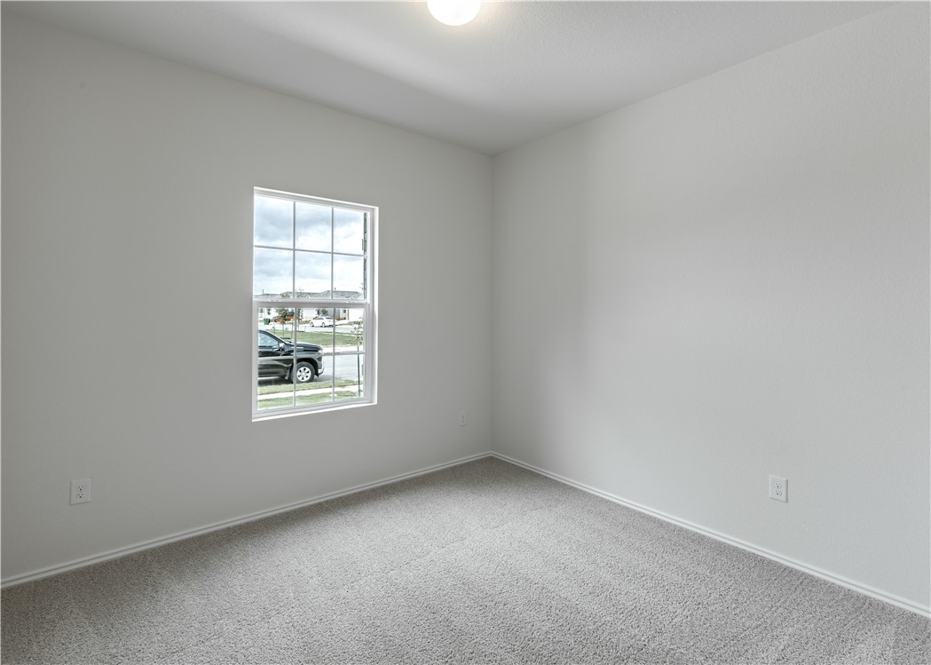 15204 Kent Justin Austin, TX 78725 - Photo 14 of 22 an empty room with a window
