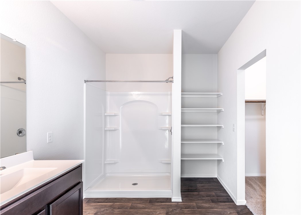 15204 Kent Justin Austin, TX 78725 - Photo 19 of 22 a bathroom with a shower