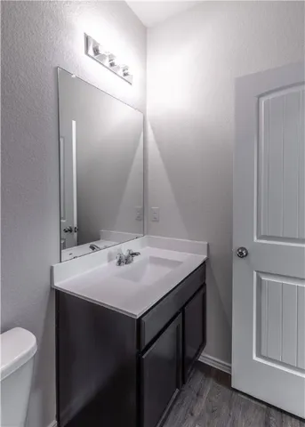 a bathroom with a sink and a toilet