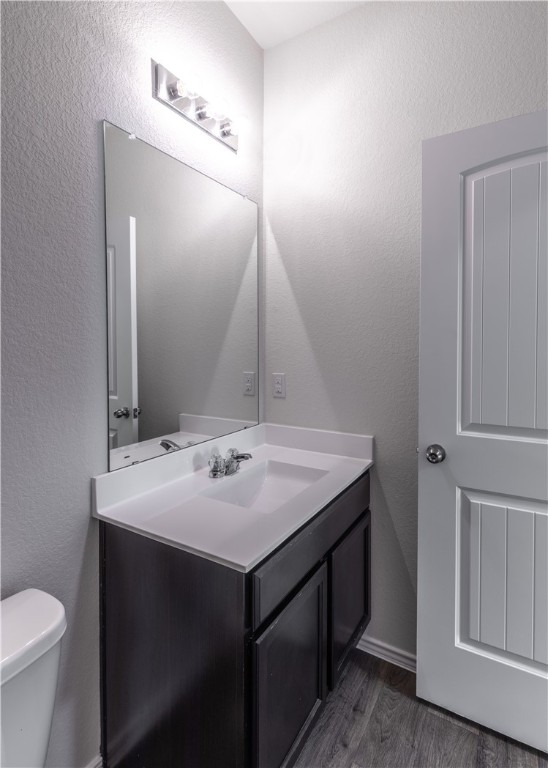 15204 Kent Justin Austin, TX 78725 - Photo 21 of 22 a bathroom with a sink and a toilet