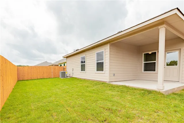 a view of a backyard with plants