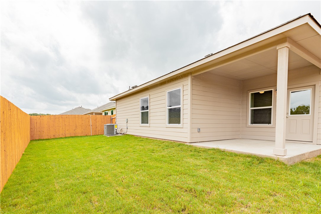 15204 Kent Justin Austin, TX 78725 - Photo 22 of 22 a view of a backyard with plants