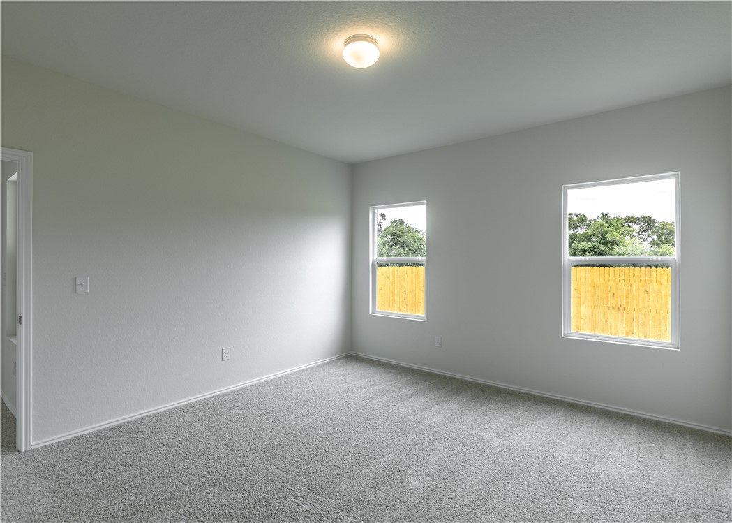 15204 Kent Justin Austin, TX 78725 - Photo 10 of 22 an empty room with a window