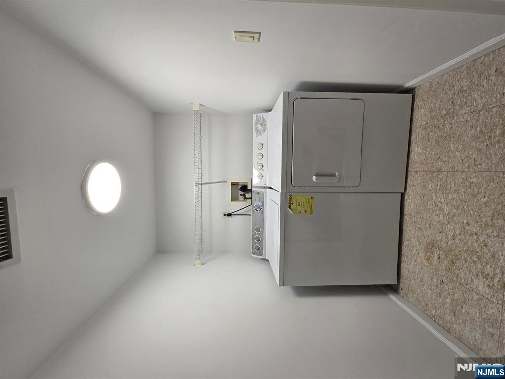 139 Stonegate Trail, Unit 40 Cresskill, NJ 07626 - Photo 21 of 23 a utility room with a sink