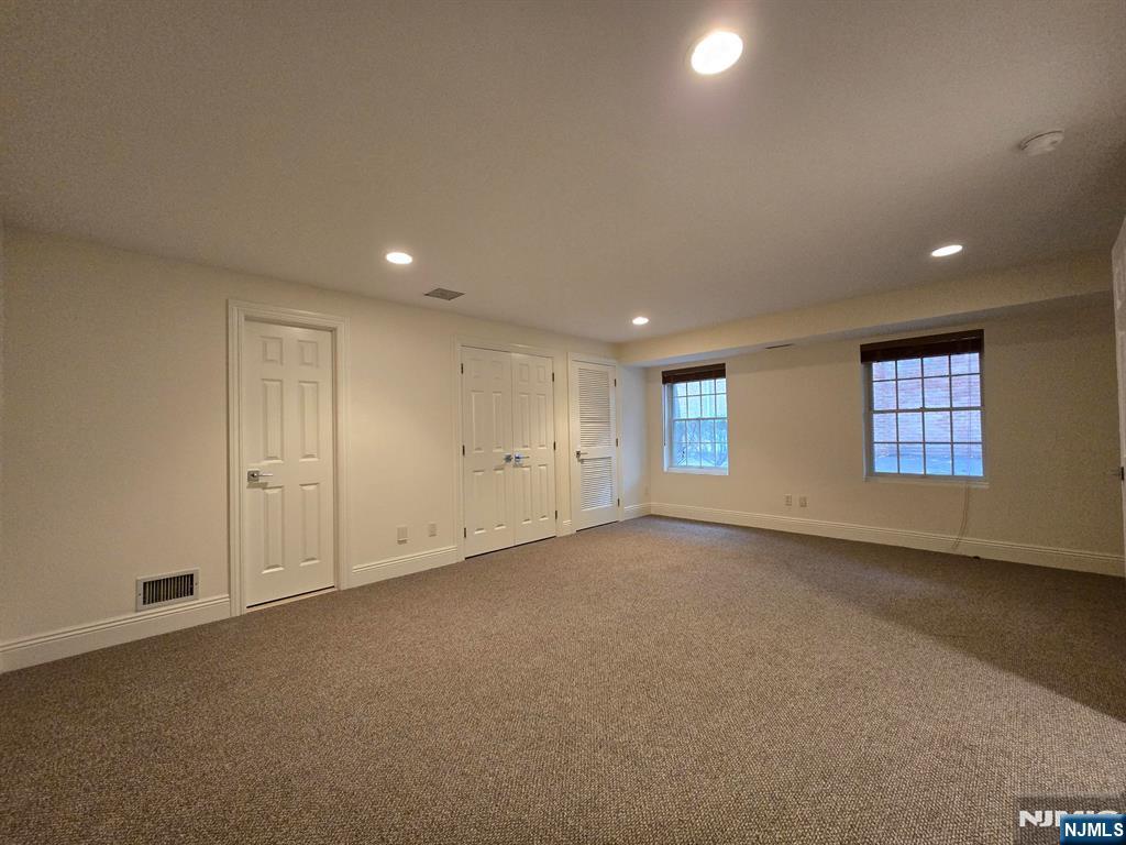 139 Stonegate Trail, Unit 40 Cresskill, NJ 07626 - Photo 22 of 23 a view of an empty room with a window