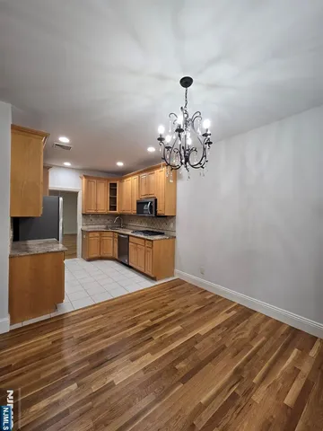 a view of kitchen and sink