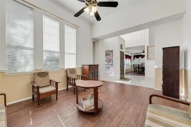 a living room with furniture and a window