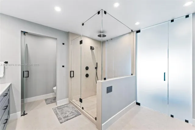 a view of walk in closet and window