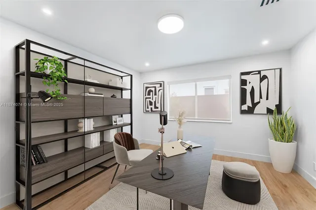 a view of a hallway with seating area