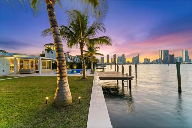 a view of multiple house with a yard