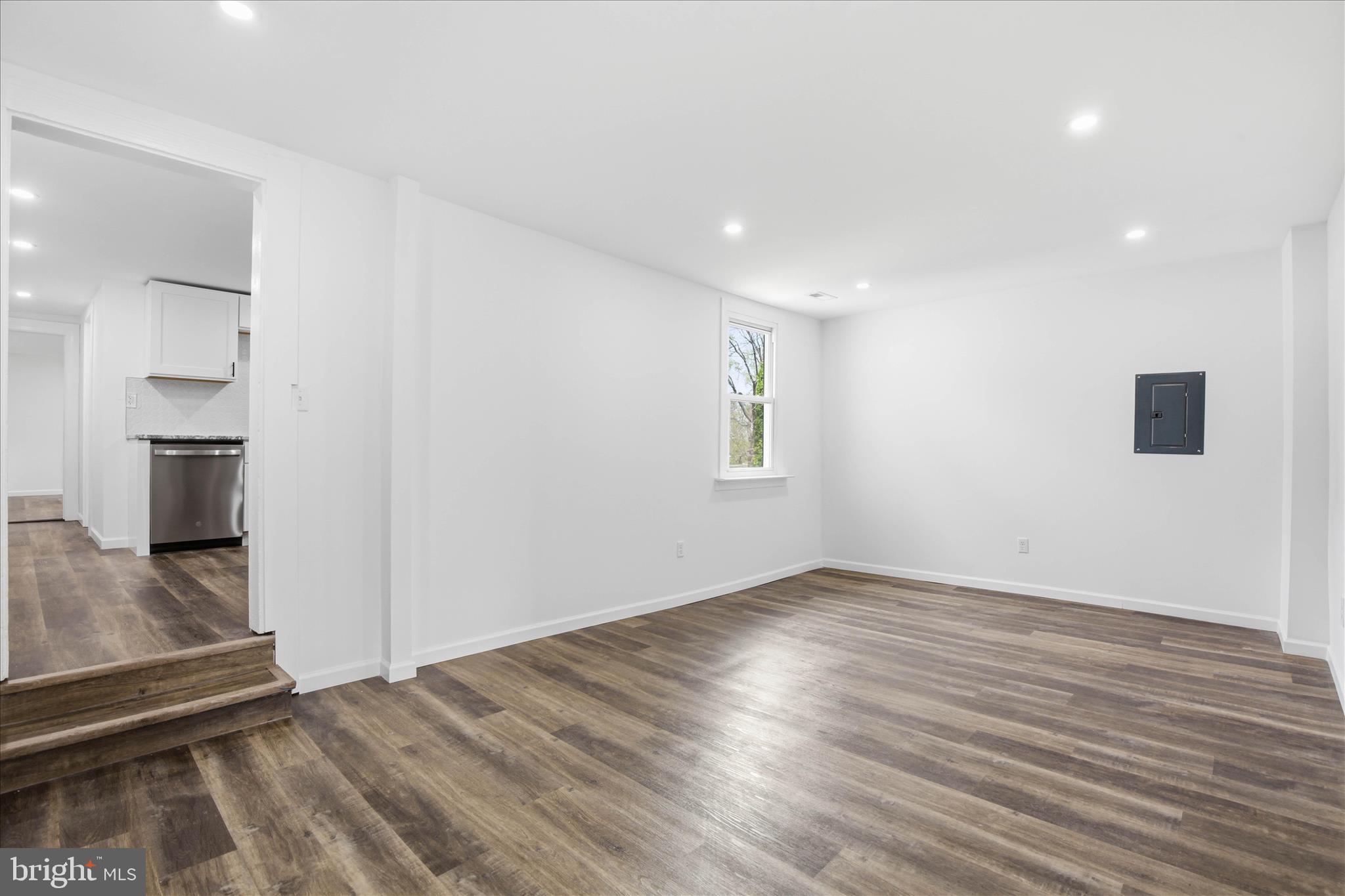 751 High Street Lancaster, PA 17603 - Photo 17 of 41 an empty room with wooden floor and a bathroom