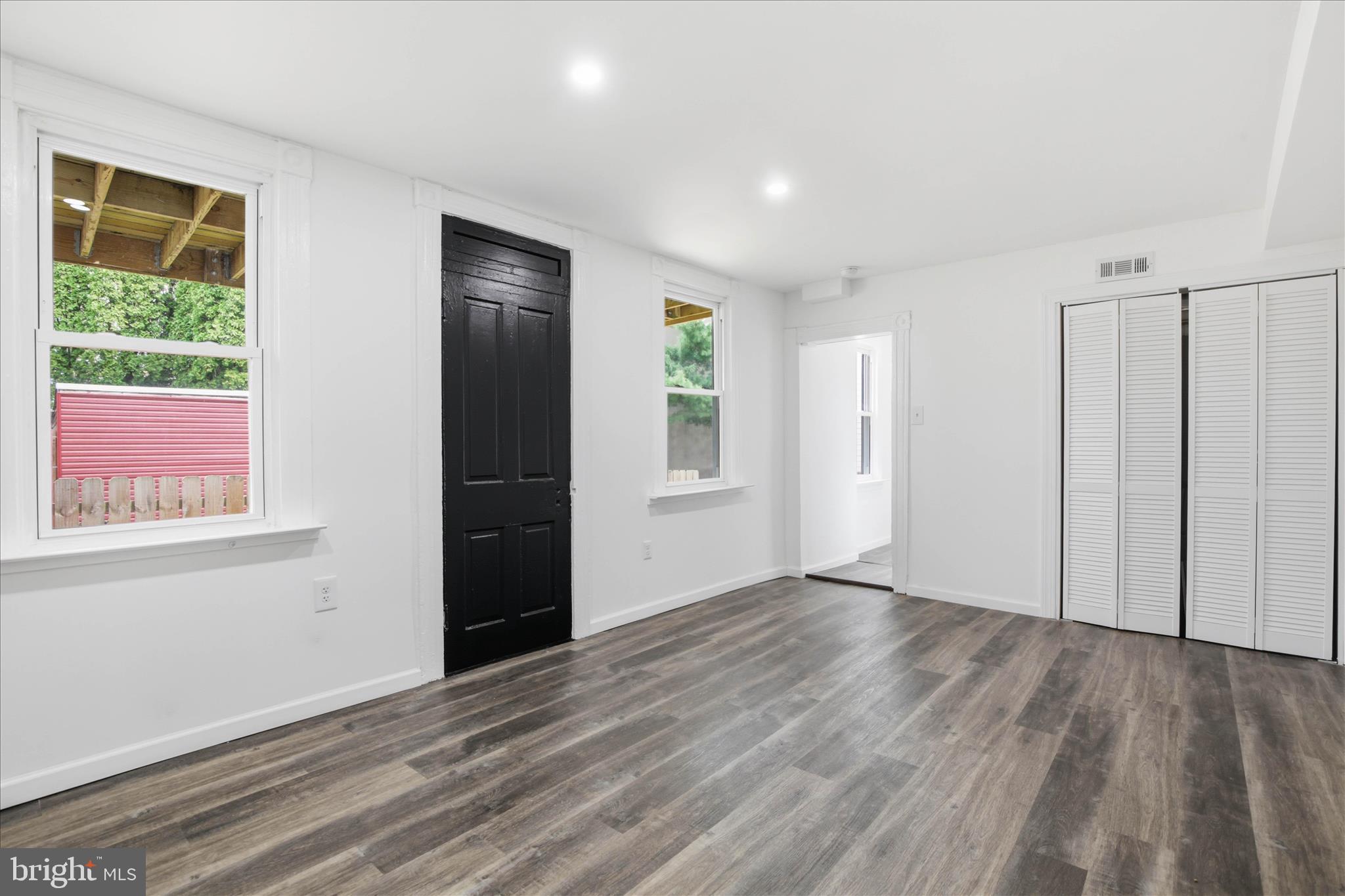 751 High Street Lancaster, PA 17603 - Photo 20 of 41 a view of an empty room with wooden floor and a window