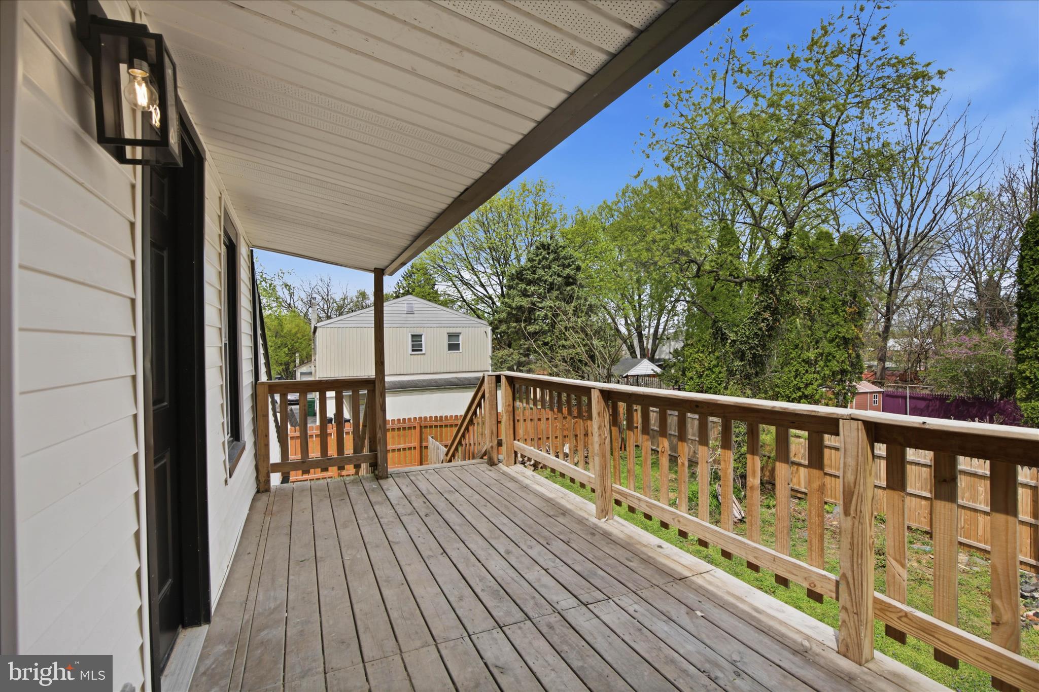 751 High Street Lancaster, PA 17603 - Photo 33 of 41 a roof deck with wooden floor and fence