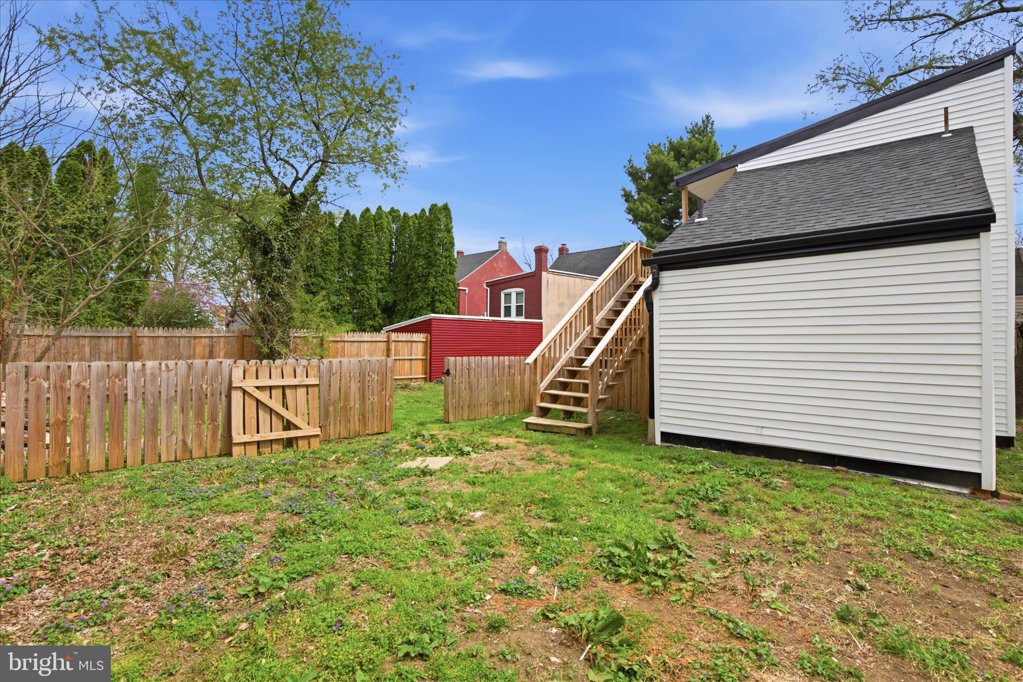 751 High Street Lancaster, PA 17603 - Photo 37 of 41 a backyard of a house with wooden fence and deck