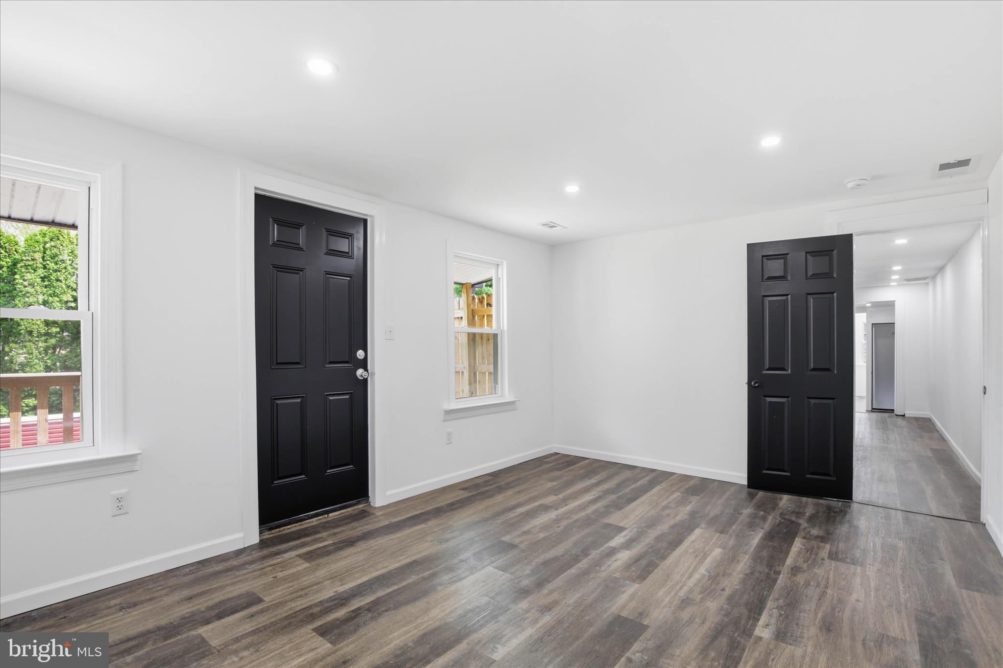 751 High Street Lancaster, PA 17603 - Photo 8 of 41 a view of an empty room with wooden floor and a window