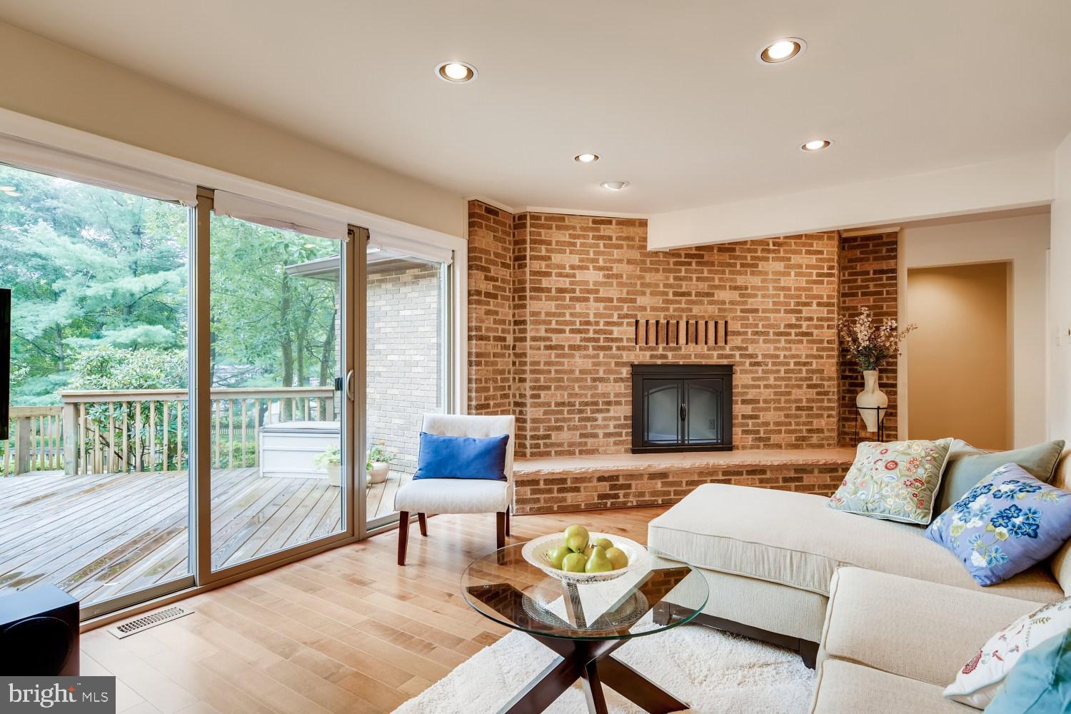 12315 Timber Grove Road Owings Mills, MD 21117 - Photo 14 of 30 Living room with brick fireplace
