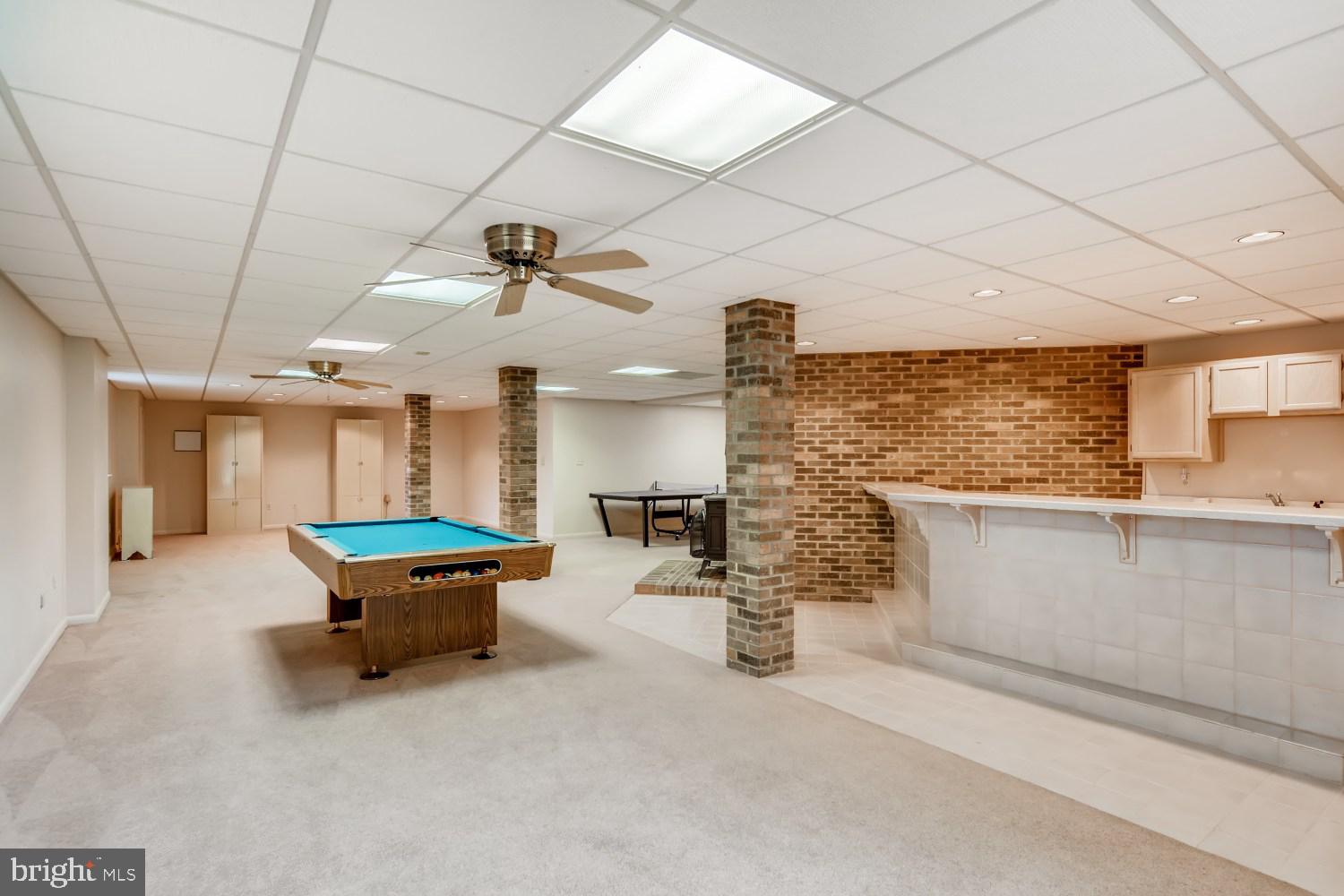 12315 Timber Grove Road Owings Mills, MD 21117 - Photo 27 of 30 basement from rear slider entrance