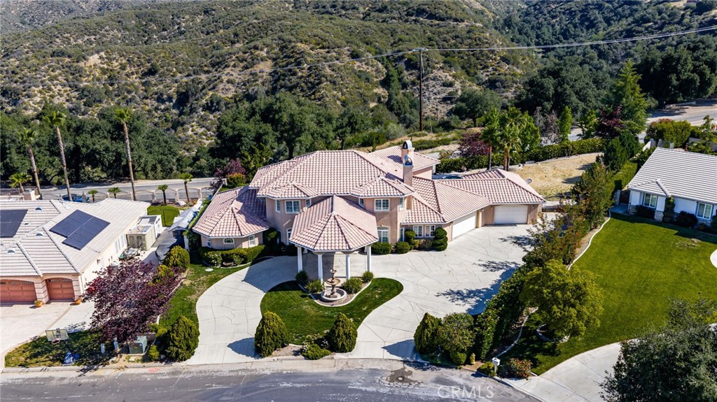 38136 Butterfly Court Yucaipa, CA 92399 - Photo 65 of 71 an aerial view of a house with a garden