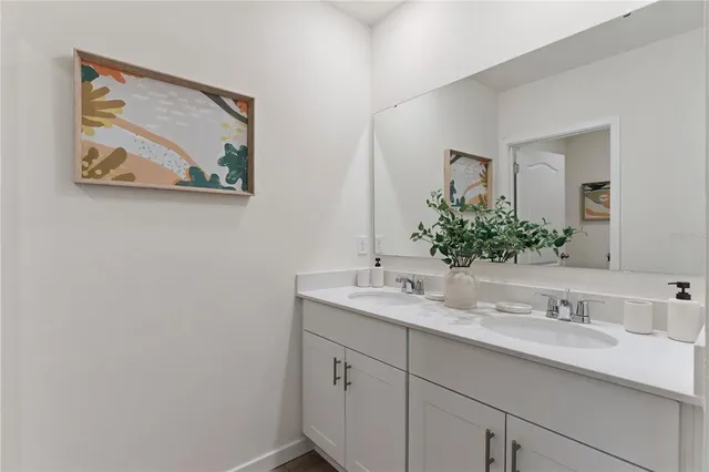 a bath room with a toilet and a bath tub