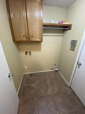 a view of a utility room with a sink