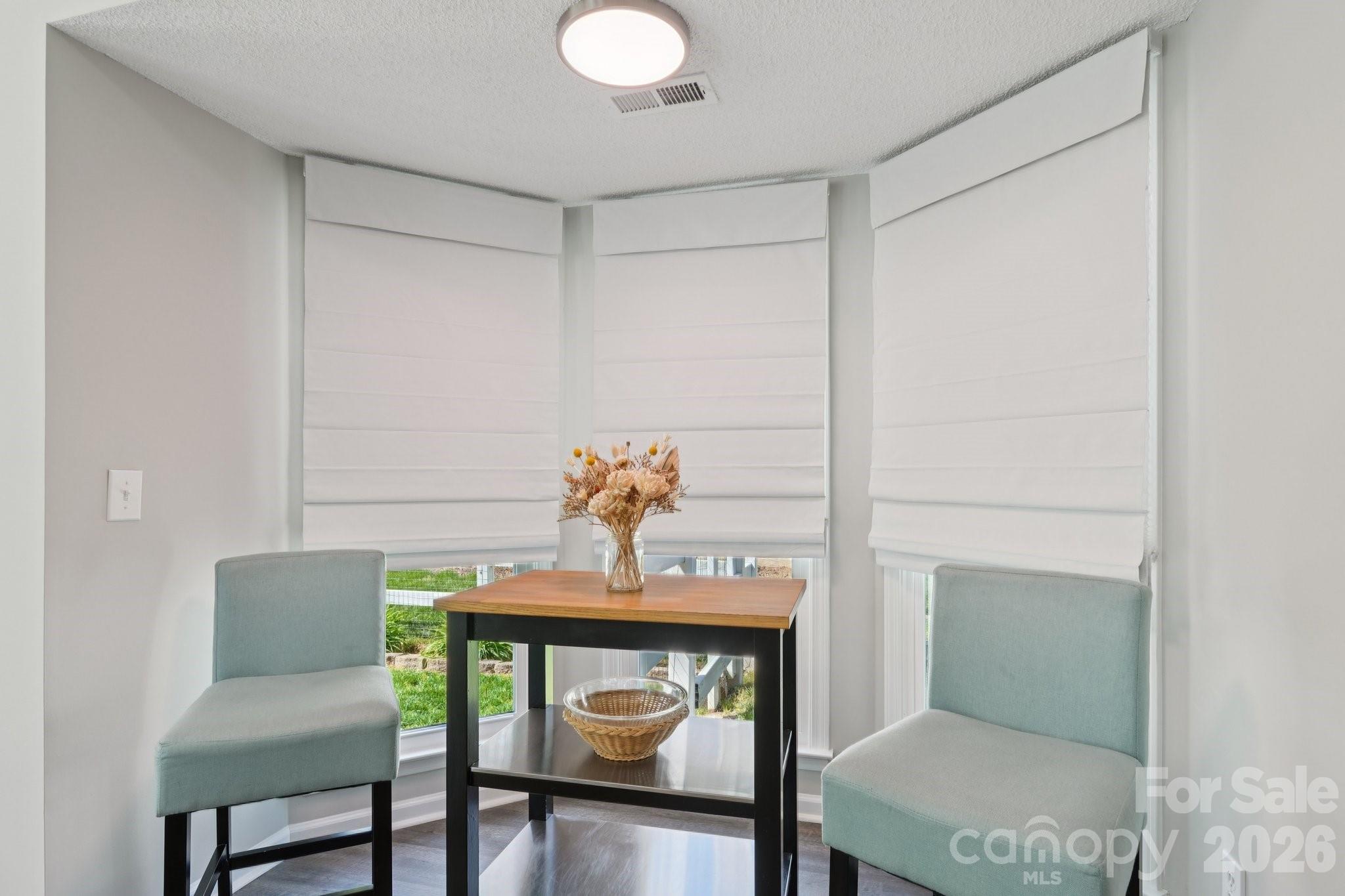 3661 Lake Spring Avenue Northwest Concord, NC 28027 - Photo 16 of 42 a view of dining room and furniture