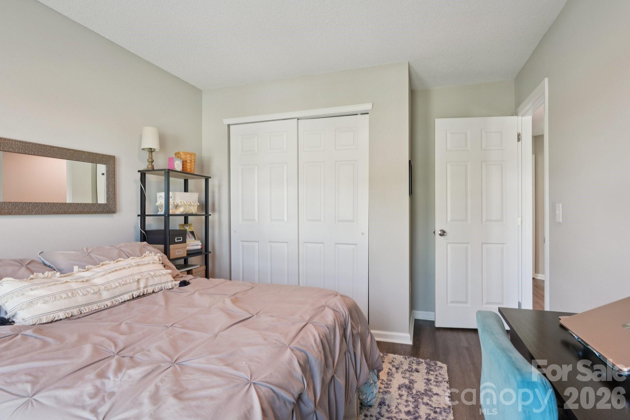 3661 Lake Spring Avenue Northwest Concord, NC 28027 - Photo 30 of 42 a bedroom with a bed and a dresser