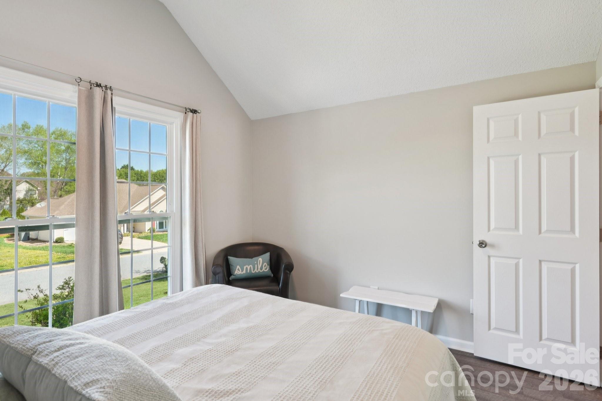 3661 Lake Spring Avenue Northwest Concord, NC 28027 - Photo 35 of 42 a bedroom with a bed and a window