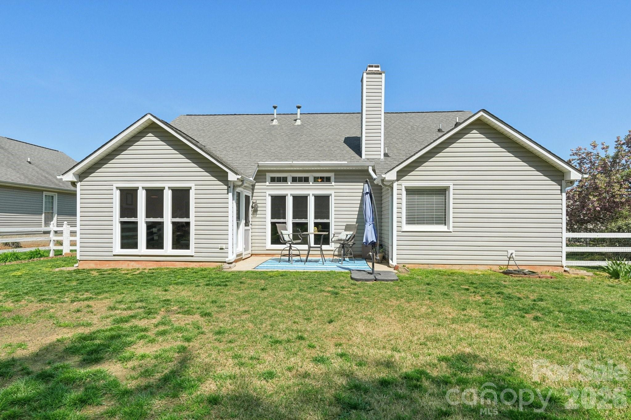 3661 Lake Spring Avenue Northwest Concord, NC 28027 - Photo 39 of 42 a front view of a house with a garden