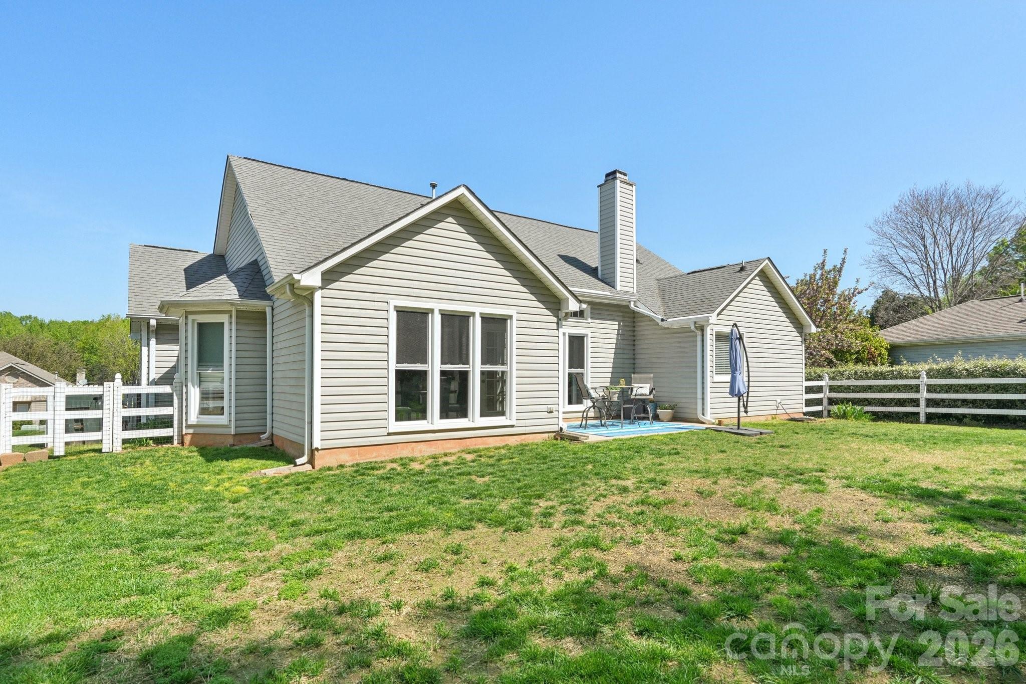 3661 Lake Spring Avenue Northwest Concord, NC 28027 - Photo 40 of 42 a front view of a house with a yard