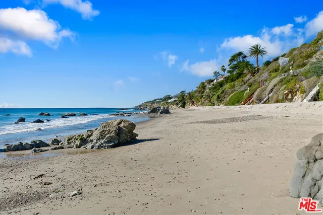 a view of a beach in an empty room