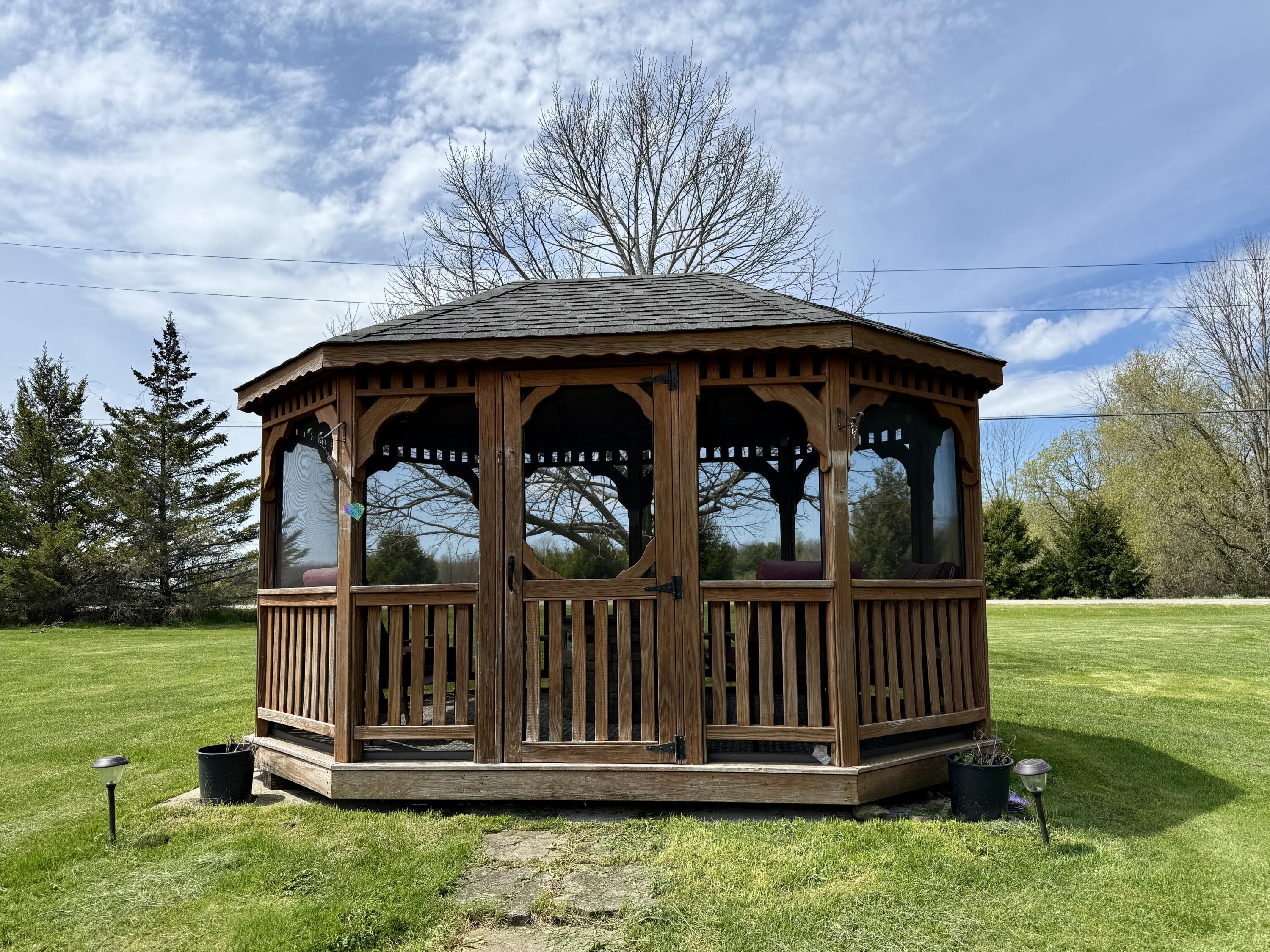 596 Dubois Road Champlain, NY 12919 - Photo 31 of 51 With ceiling fan and propane fire pit.