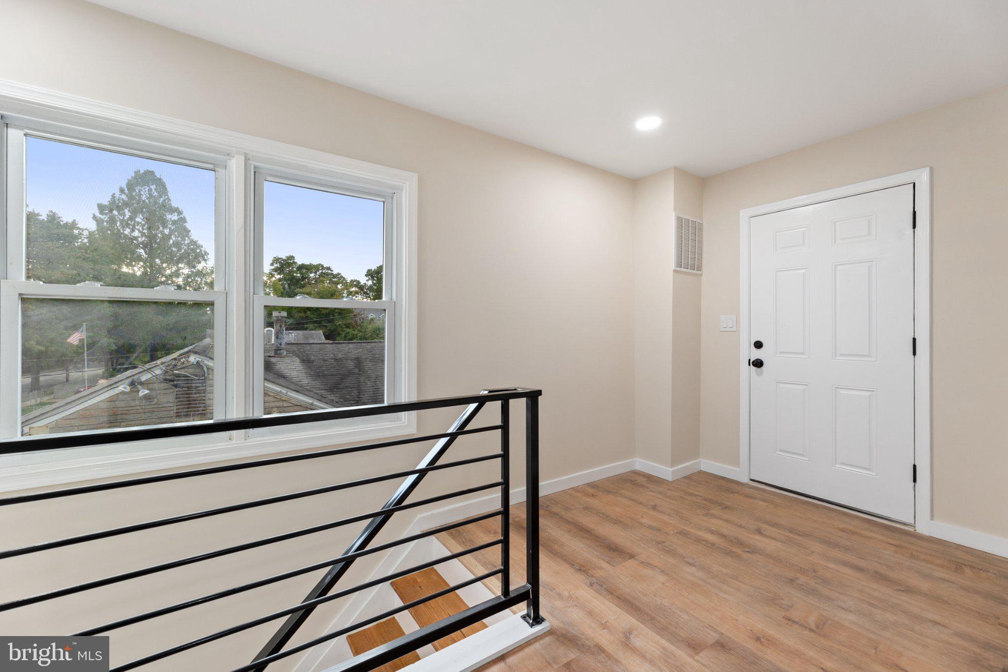 3215 Edgewood Road Kensington, MD 20895 - Photo 21 of 37 Bright and airy entryway with views.
