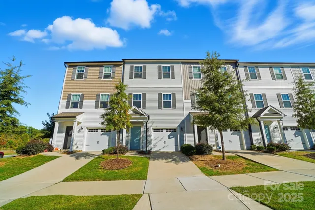 a view of a building with a street
