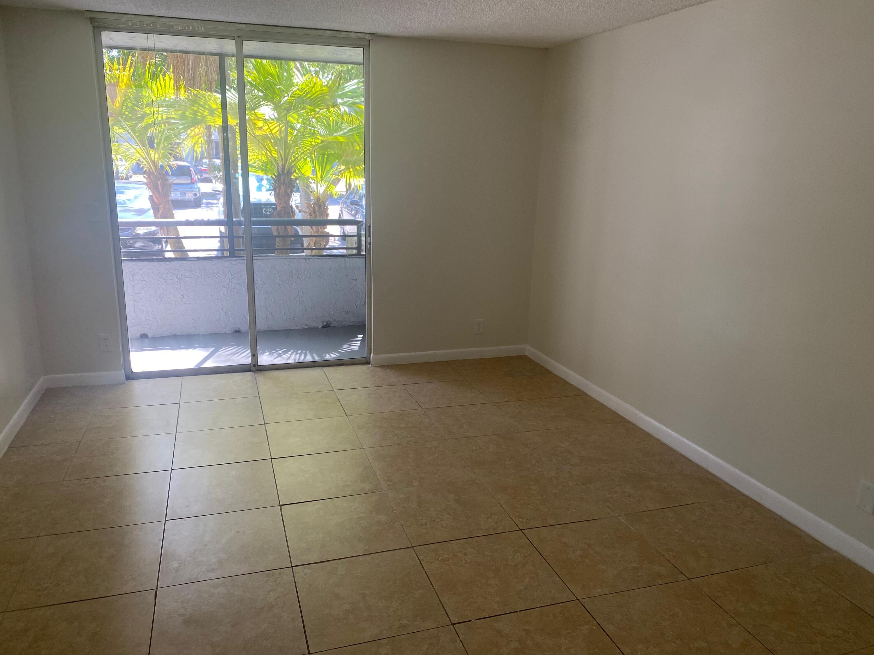 601 Lyons Road, Unit 7105 Coconut Creek, FL 33063 - Photo 5 of 13 a bathroom with a window